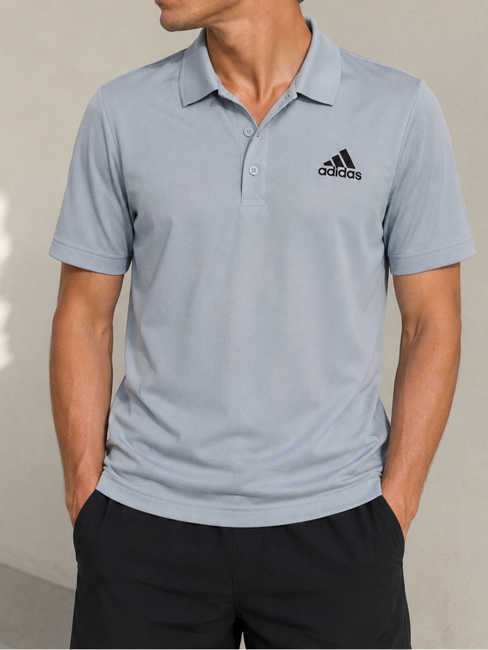 adidas Men’s Light Blue Polo Shirt with Black Logo